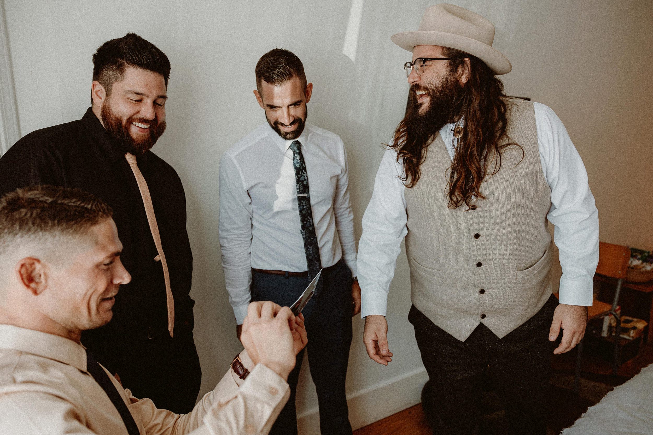 Groom getting ready at the alamo motel in los alamos